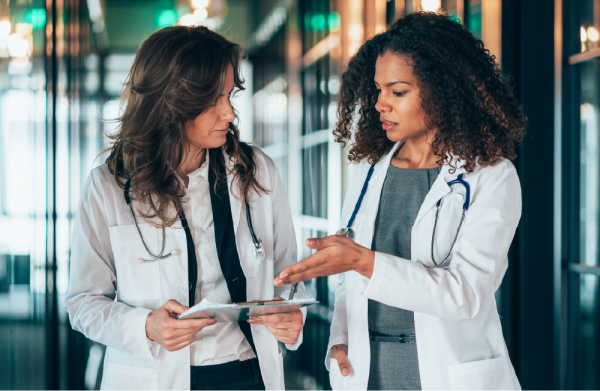 two doctors reviewing a file