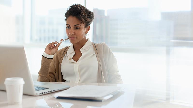 woman looking at computer