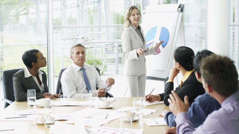 Businesspeople having meeting in conference room