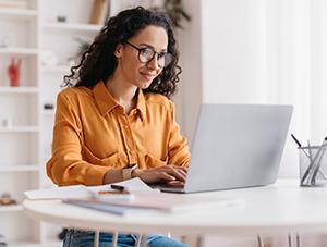 woman looking at computer